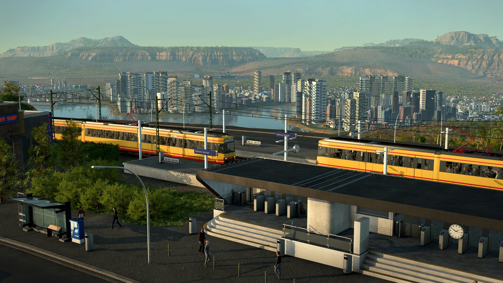 Modern city with light rail, coastal bay, and rocky mountain backdrop — official TF3 press kit screenshot
