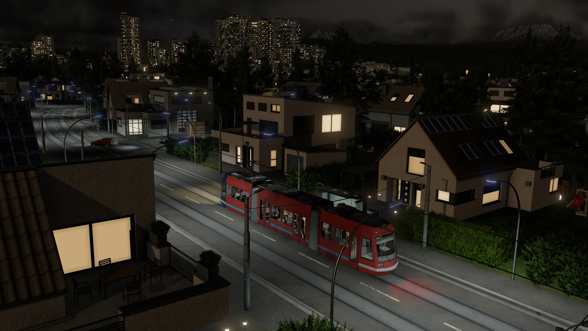 Modern tram at night in residential city — official TF3 press kit